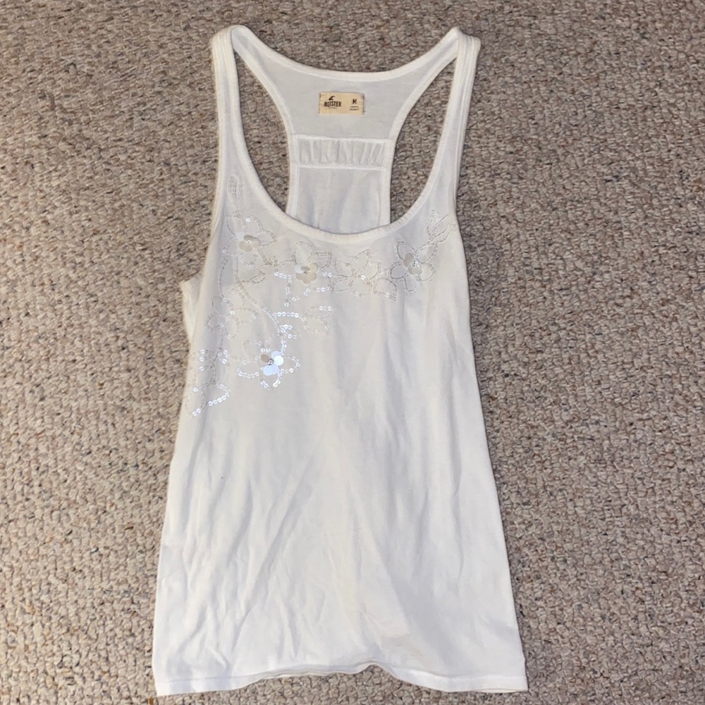 White hollister tank top with flower design